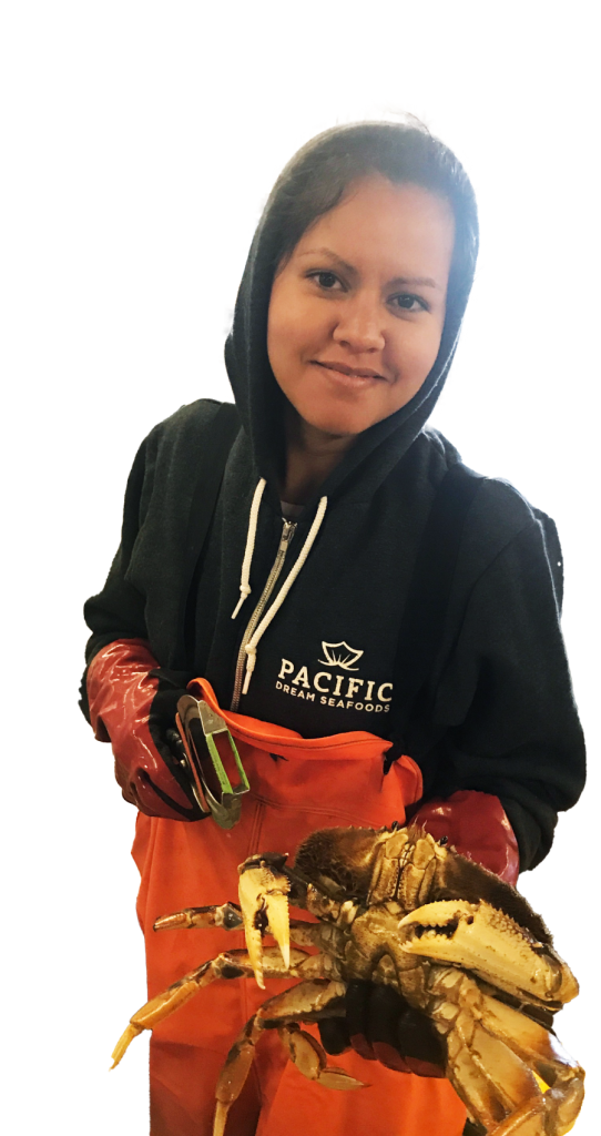 Girl holding live Dungeness crab